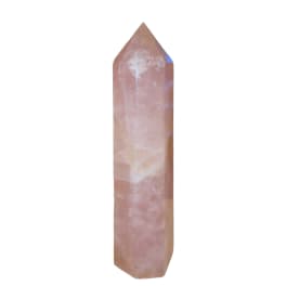 Pink crystal point on a white background