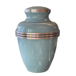 Light blue urn with silver bands and lid