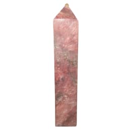 Pink polished crystal tower with a pointed top