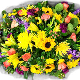 Bright mixed bouquet with yellow, orange, purple, and pink flowers