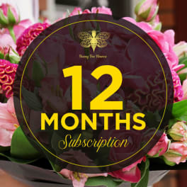 Graphic for a 12-month flower subscription over a bouquet of pink flowers