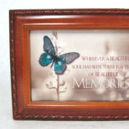 Framed memorial plaque with a blue butterfly and the word Memories