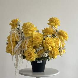 Sunny pot yellow French rose arrangement