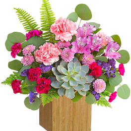 Pink and purple mixed bouquet with a succulent in a wooden box
