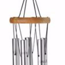 Hanging metal wind chime with a wooden tag