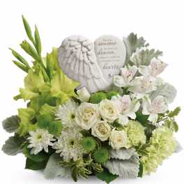 White sympathy bouquet with roses, lilies, and a memorial angel plaque
