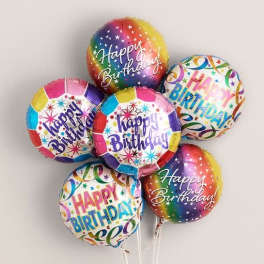 Cluster of colorful Happy Birthday balloons on sticks
