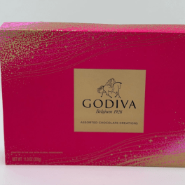 Godiva assorted chocolate box in bright pink and gold packaging
