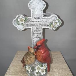 Decorative cross with a cardinal figurine and memorial text