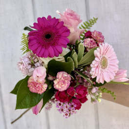 Pink and magenta mixed bouquet with gerbera daisies and roses