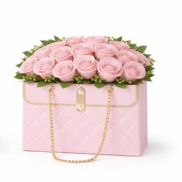Pink roses arranged in a pink box with a gold chain handle