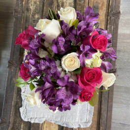Bouquet of purple alstroemeria and pink and white roses