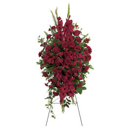 Tall burgundy floral standing spray on an easel