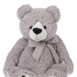 Gray teddy bear with a ribbon bow