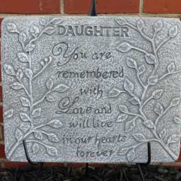 Decorative memorial plaque with leaf relief and the word Daughter.