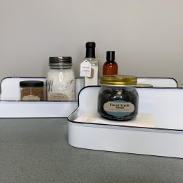 Gift trays with bath and body products in jars and bottles