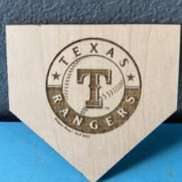 Texas Rangers logo on a wooden plaque