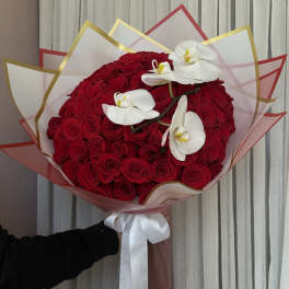 Large bouquet of red roses with white orchids and a white ribbon
