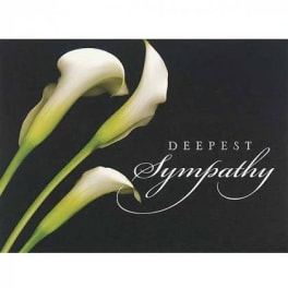 Three white calla lilies on a black background with sympathy text
