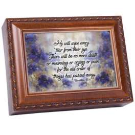 Framed memorial plaque with a Bible verse on a blue and white background