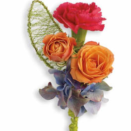 Small boutonniere with orange roses, pink carnation, and blue hydrangea with green wire accent