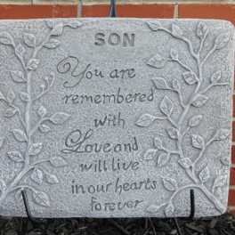 Memorial stone with the word SON and a remembrance message