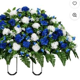Blue and white floral funeral spray with fern greenery