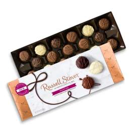 Two boxes of assorted chocolate truffles on a white background