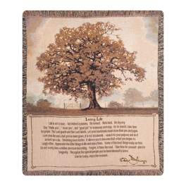 Fringed throw blanket with a tree illustration and printed text