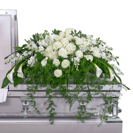 White floral casket spray with roses and calla lilies