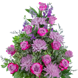 Pink roses and lavender chrysanthemums in a white basket