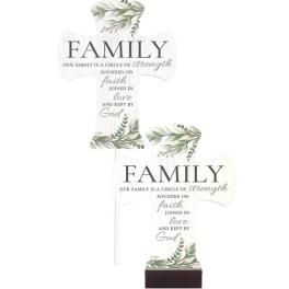 Two decorative cross signs with family text and leaf accents