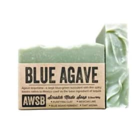 Green 'Blue Agave' bar soap with kraft paper label and a second textured soap bar behind it
