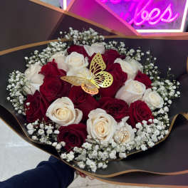 roses red and white with babies breath