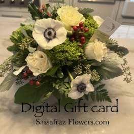 Bouquet of white flowers with red berries and green accents