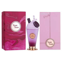 Perfume bottle with two pink product boxes