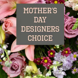 Mixed pink and lavender flowers with lilies and roses, overlaid with a Mother's Day sign