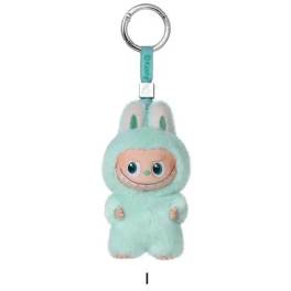 Mint plush character keychain with a metal ring