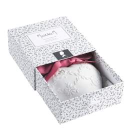 Decorative gift box with a pink ribbon and white embroidered item inside