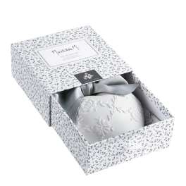 Decorative gift box with a white embroidered item and gray ribbon