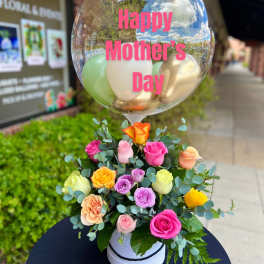 Mixed roses in a white box with a clear Mother's Day balloon