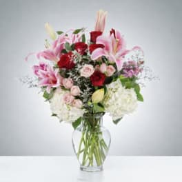 Eternal Adoration Roses and Assorted lilies