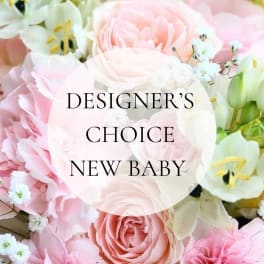 Pink and white floral arrangement with roses and lilies, labeled New Baby
