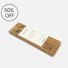 Rectangular cardboard gift box with floral line art and a 50% off badge
