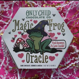 Box of Only Child Chocolate Co. Magic Frog Oracle chocolates on pink filler