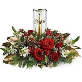 Holiday centerpiece with red roses, white flowers, pinecones and a gold candle in a glass holder