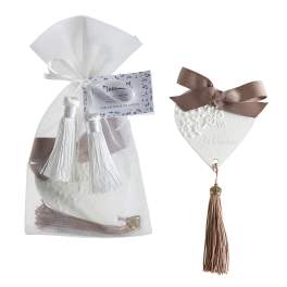 Decorative heart-shaped ornament and a mesh gift pouch with tassels