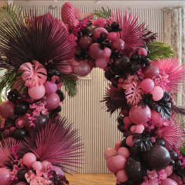 Pink & black floral decor with a tropical flare