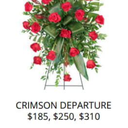 Standing spray of red roses on a metal easel