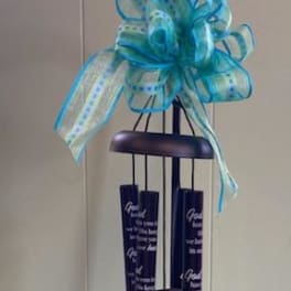 Black memorial wind chime with a blue ribbon bow